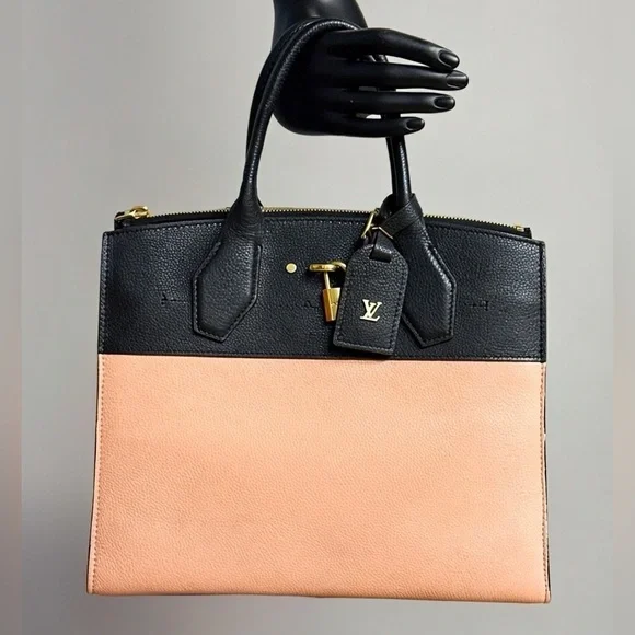 Louis Vuitton City Steamer MM bag in pink and black taurillon leather - Picture 1 of 17